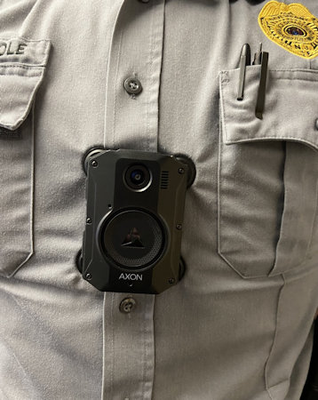 Body Worn Camera on Grey police Shirt